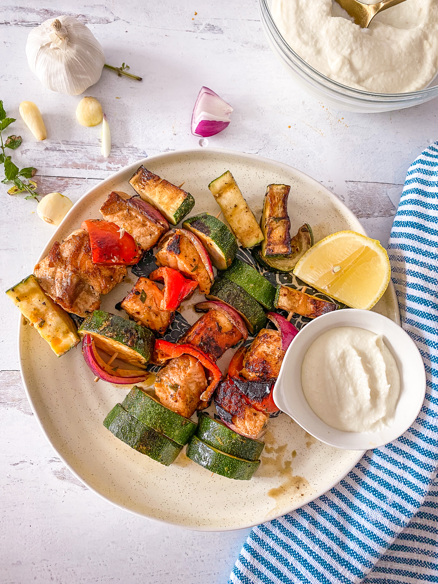 Whipped Lebanese Garlic adds a kick to these salmon kabobs.